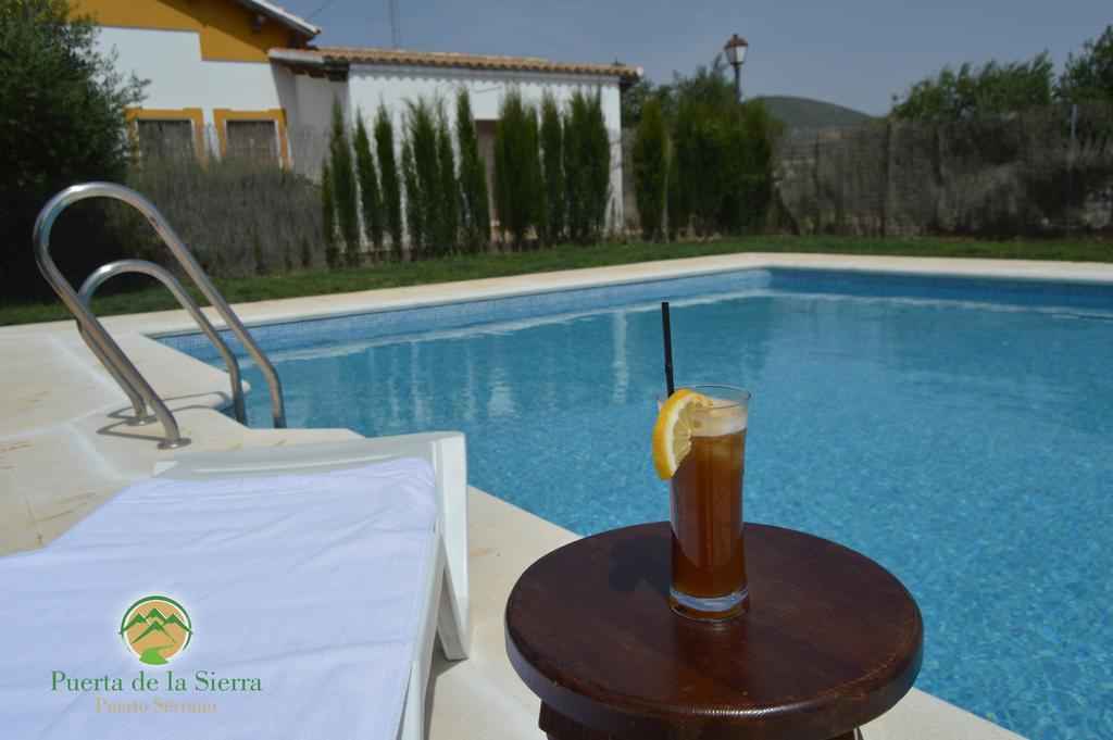 Apartamentos Puerta Sierra Puerto Serrano Bagian luar foto