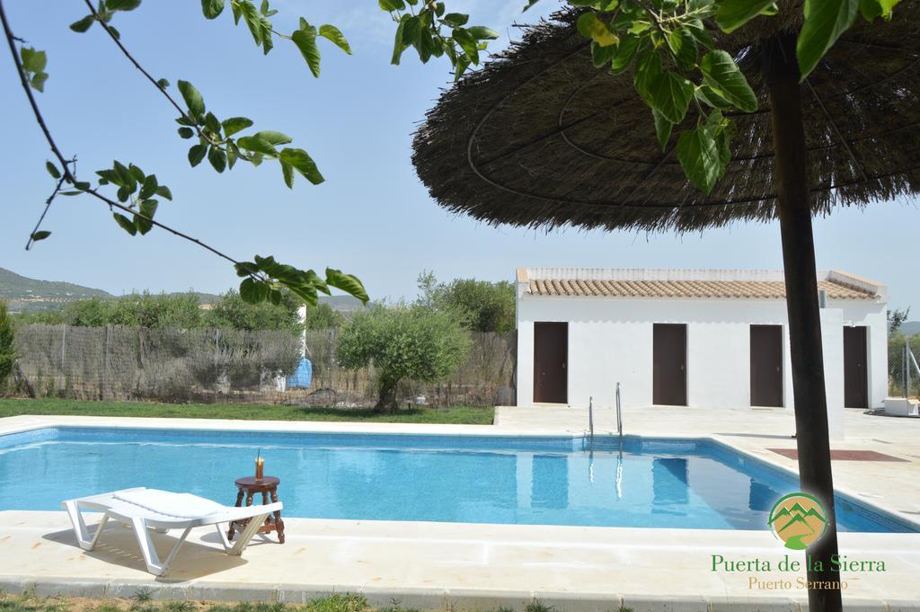 Apartamentos Puerta Sierra Puerto Serrano Bagian luar foto